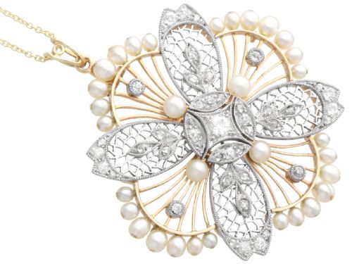 fig 5. An openwork circular Edwardian floral pendant brooch crafted in rose gold and platinum, set with central diamonds and a perimeter of natural pearls.