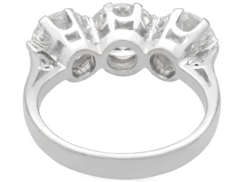 fig 4. A vintage 18ct white gold trilogy ring featuring three round brilliant cut diamonds set in claw settings.
