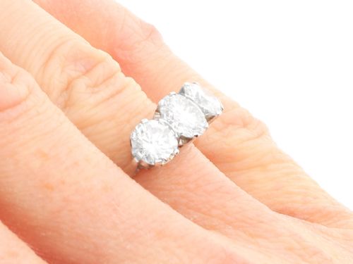 fig 7. A vintage 18ct white gold trilogy ring featuring three round brilliant cut diamonds set in claw settings.