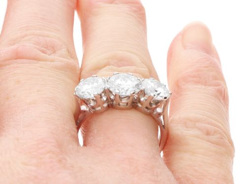 fig 8. A vintage 18ct white gold trilogy ring featuring three round brilliant cut diamonds set in claw settings.