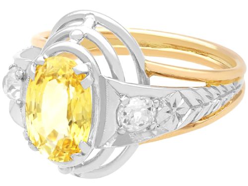 fig 5. An Art Deco 18ct yellow gold and platinum ring featuring a central oval yellow sapphire flanked by single diamonds.