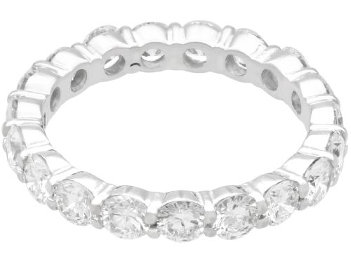 fig 5. A vintage 18ct white gold full eternity ring set with round brilliant-cut diamonds around the entire band.
