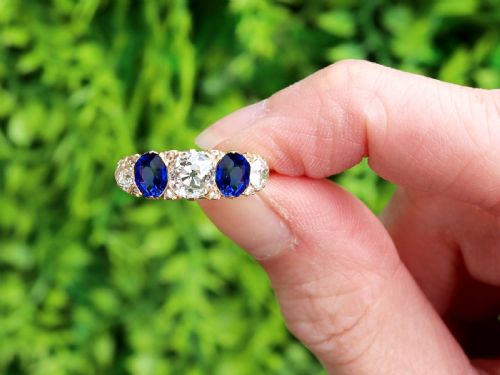 fig 1. An antique 18ct yellow gold five stone ring set with alternating blue sapphires and old-cut diamonds.