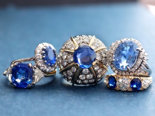 fig 3. An antique 18ct yellow gold five stone ring set with alternating blue sapphires and old-cut diamonds.