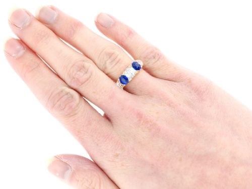 fig 7. An antique 18ct yellow gold five stone ring set with alternating blue sapphires and old-cut diamonds.