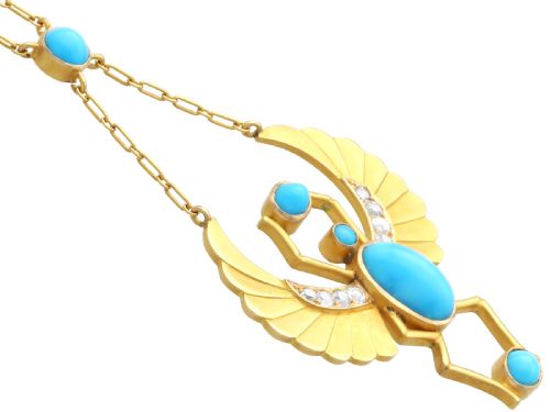 fig 6. An 18ct yellow gold Egyptian Revival pendant crafted in the shape of a winged scarab beetle with turquoise cabochons and set with diamonds.