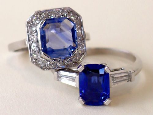fig 2. An Art Deco platinum ring featuring a central cushion-cut blue sapphire flanked by a stepped baguette-cut diamond on each shoulder.