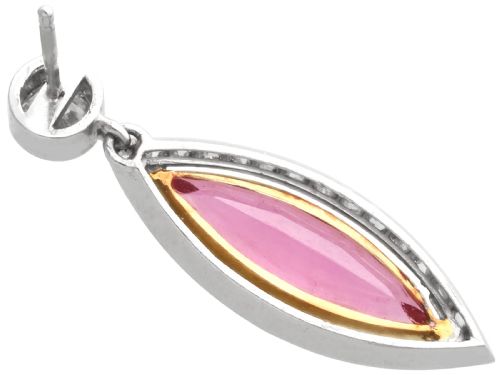 fig 6. Pair of Art Deco platinum drop earrings featuring navette-cut pink tourmalines bordered by small diamonds, suspended from round diamond studs.