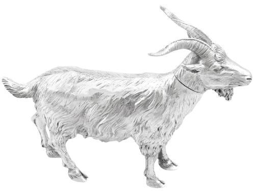 fig 4. An antique German sterling silver sugar box realistically sculpted in the shape of a standing goat with textured fur and curved horns.