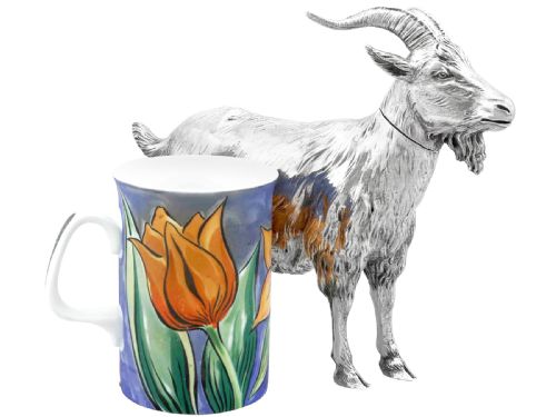 fig 5. An antique German sterling silver sugar box realistically sculpted in the shape of a standing goat with textured fur and curved horns.