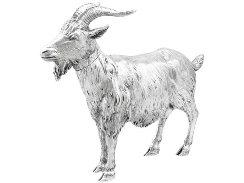fig 6. An antique German sterling silver sugar box realistically sculpted in the shape of a standing goat with textured fur and curved horns.