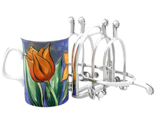 fig 5. An antique sterling silver toast rack designed with equestrian riding spurs and rowels.