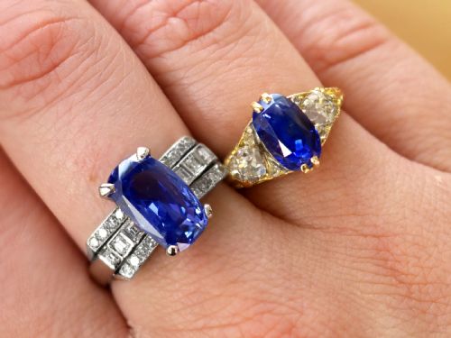 fig 2. An Art Deco platinum cocktail ring featuring a large cushion-cut blue Ceylon sapphire held in four prongs between geometric diamond-set shoulders.