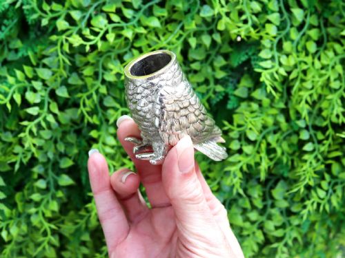 fig 3. A Victorian sterling silver pepperette cast in the detailed likeness of a cockatoo with pierced holes along its crest.