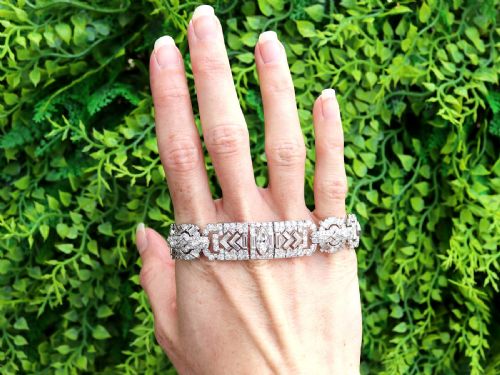 fig 1. An Art Deco platinum bracelet set with a central marquise diamond and surrounding geometric rows of baguette and round diamonds.