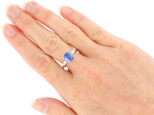 fig 8. An Art Deco platinum ring featuring a cushion-cut blue sapphire flanked by two tapered baguette diamonds.