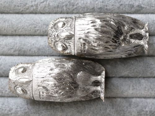 fig 4. A pair of Edwardian sterling silver pepperettes sculpted in the shape of standing owls with textured feather detailing.