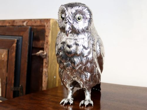 fig 2. An antique sterling silver sugar box realistically cast and chased in the form of a standing owl with detailed feather textures and set eyes.