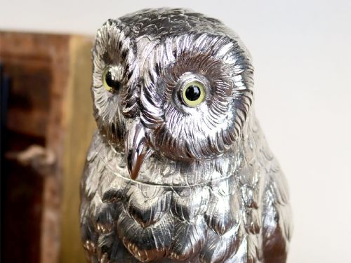 fig 4. An antique sterling silver sugar box realistically cast and chased in the form of a standing owl with detailed feather textures and set eyes.