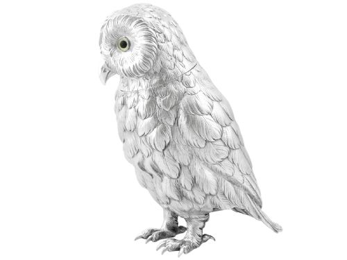 fig 5. An antique sterling silver sugar box realistically cast and chased in the form of a standing owl with detailed feather textures and set eyes.