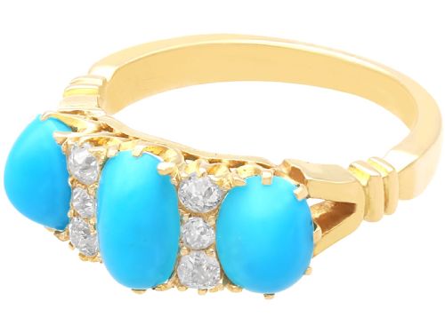 fig 6. A late Victorian 15ct yellow gold ring featuring three oval turquoise cabochons separated by small diamond accents.