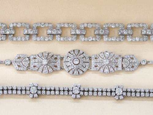 fig 3. An Art Deco platinum link bracelet set with round diamonds throughout four open rectangular square links.