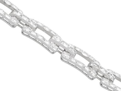 fig 6. An Art Deco platinum link bracelet set with round diamonds throughout four open rectangular square links.