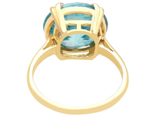 fig 6. An Edwardian 18ct yellow gold solitaire ring mounted with a round brilliant cut vibrant blue zircon in a claw setting.