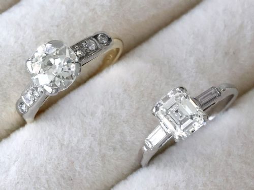 fig 3. A round central diamond solitaire ring in a platinum claw setting with diamond-set shoulders on a 14ct yellow gold band.