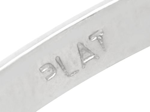 fig 6. A platinum trilogy ring featuring three round brilliant diamonds set in individual claw mounts along a slender polished band stamped PLAT.
