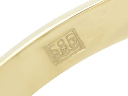 fig 6. A 14ct yellow gold signet ring set with an octagonal black onyx plaque featuring a central round diamond bezel setting.
