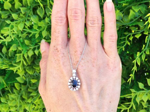 VINTAGE 148CT SAPPHIRE AND 080CT DIAMOND 14CT WHITE GOLD CLUSTER PENDANT CIRCA 1960 - ADDITIONAL PHOTO 1