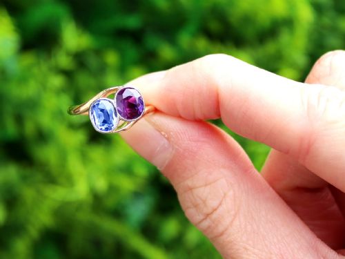 fig 1. An Edwardian 18ct yellow gold twist ring set with a cushion cut blue sapphire and pink sapphire in platinum settings.