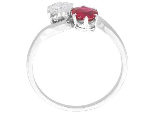 fig 6. An Art Deco platinum twist ring featuring a circular red Burmese ruby and a brilliant white diamond set side by side on a curved band.