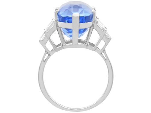 fig 9. A large oval blue Ceylon sapphire set in platinum with stepped baguette diamond shoulders.