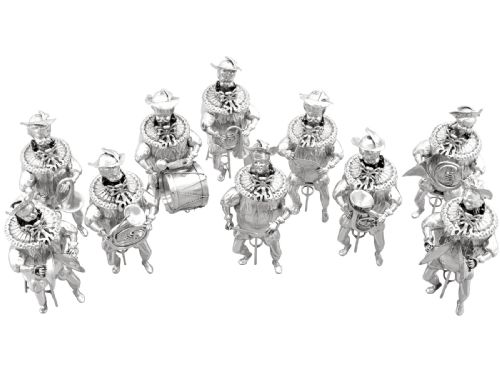 fig 1. A set of German sterling silver musician figures depicting a miniature band with instruments in historic costume.
