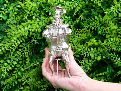 fig 2. A set of German sterling silver musician figures depicting a miniature band with instruments in historic costume.