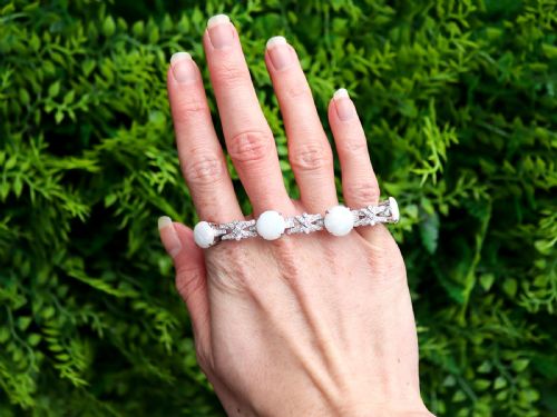 VINTAGE 941CT WHITE OPAL 252CT DIAMOND AND 18CT WHITE GOLD BRACELET CIRCA 1950 - ADDITIONAL PHOTO 1