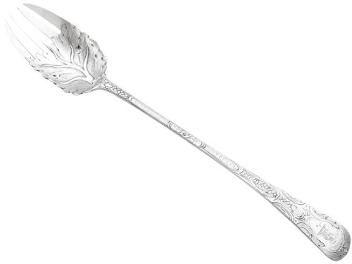 fig 3. Pair of antique George III sterling silver salad servers with leaf-shaped bowls and engraved stems.