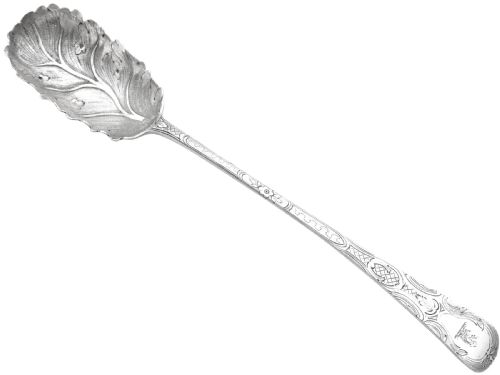 fig 4. Pair of antique George III sterling silver salad servers with leaf-shaped bowls and engraved stems.