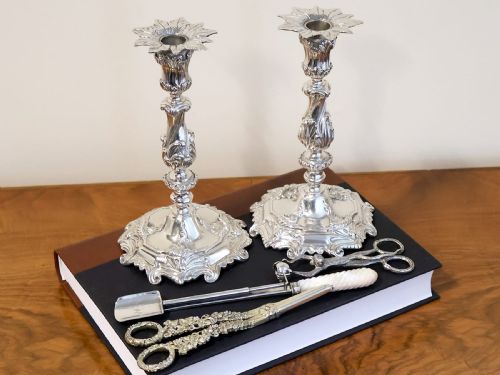 fig 3. A pair of Victorian sterling silver gilt grape shears featuring cast grapevine and leaf motifs along the handles.