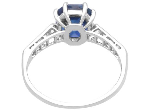fig 6. An Art Deco platinum solitaire ring set with an octagonal blue Burmese sapphire flanked by diamond-set shoulders.
