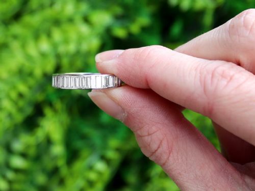 fig 1. A platinum full eternity ring set with end-to-end channel-set baguette cut diamonds.