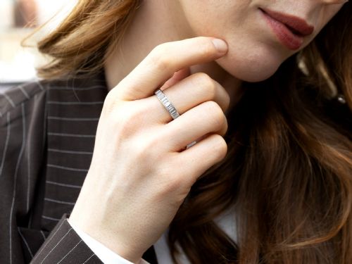 fig 2. A platinum full eternity ring set with end-to-end channel-set baguette cut diamonds.