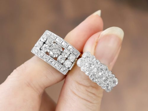 fig 3. An Edwardian 18ct yellow gold and platinum cluster ring set with multiple old-cut diamonds in a scalloped setting.