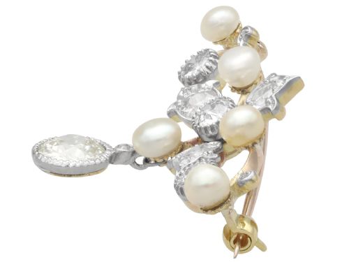 fig 6. An Edwardian 9ct yellow gold brooch featuring old cut diamonds, pearls, and a central drop pendant.