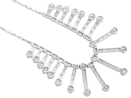 fig 7. An Art Deco platinum fringe necklace set with baguette and round cut diamonds arranged in a geometric drop pattern.