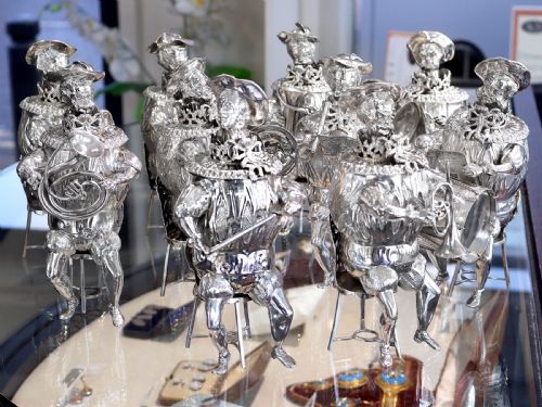 fig 5. A set of German sterling silver musician figures depicting a miniature band with instruments in historic costume.