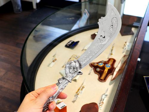 fig 4. An engraved Victorian sterling silver fish serving knife and fork set presented inside a fitted black box.