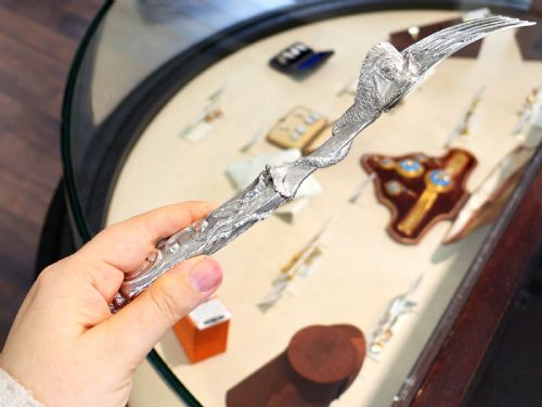 fig 5. An engraved Victorian sterling silver fish serving knife and fork set presented inside a fitted black box.